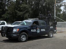 Mexico's federal police chief sacked by Enrique Pena Nieto following report alleging cartel executions