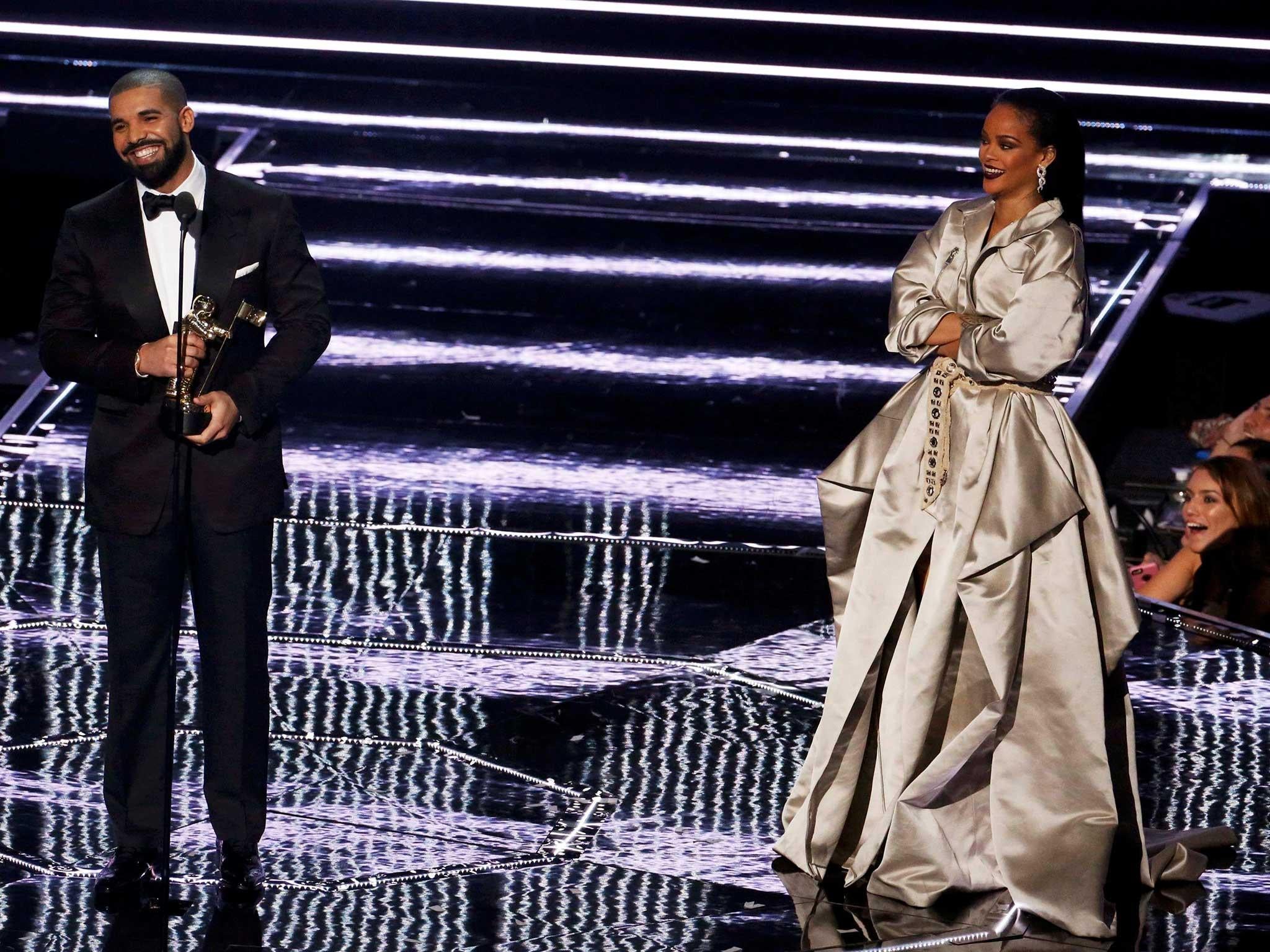 Drake presents Rihanna with the Michael Jackson Video Vanguard Award during the 2016 MTV Video Music Awards