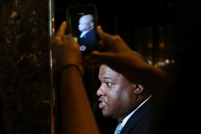 Mark Burns, a televangelist, has apologised for tweeting a cartoon of Hillary Clinton in blackface