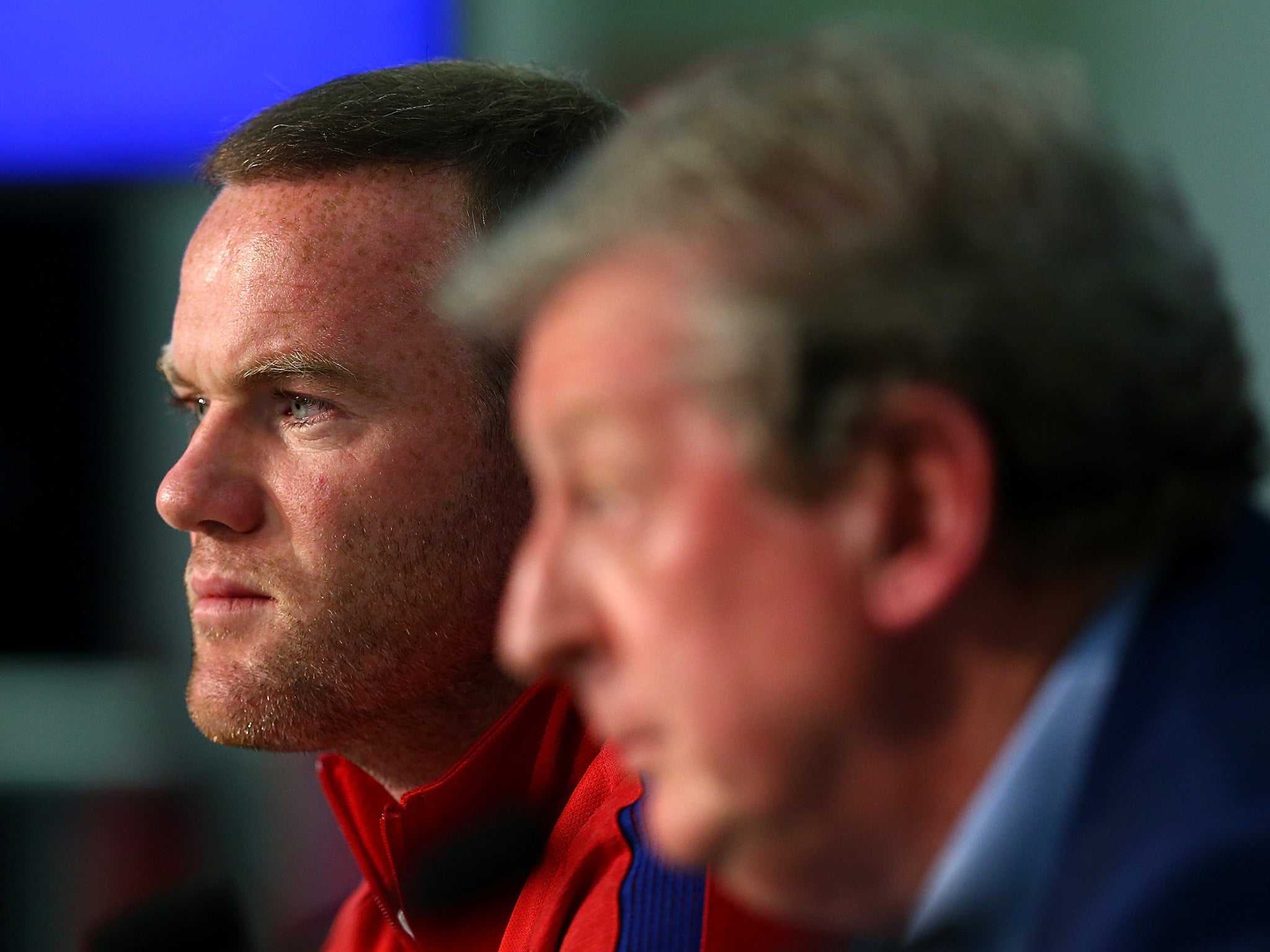 Rooney and Hodgson at a press conference during the tournament