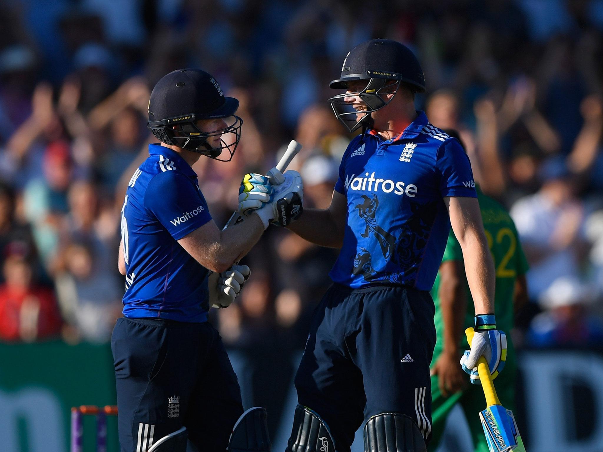 Eoin Morgan (left) and Jos Buttler both made telling contributions to England’s record score