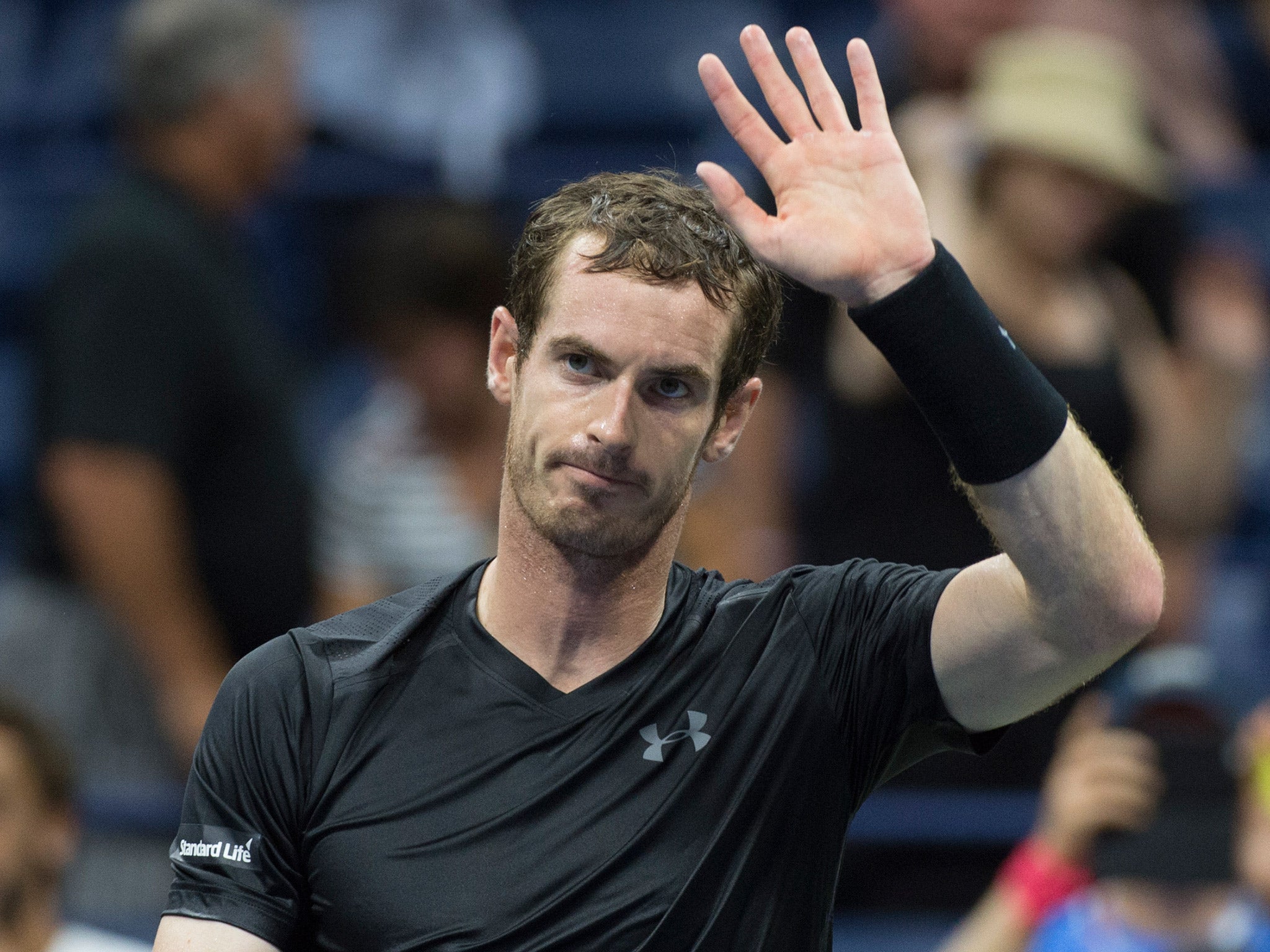 Andy Murray beat Lukas Rosol to reach the second round of the US Open