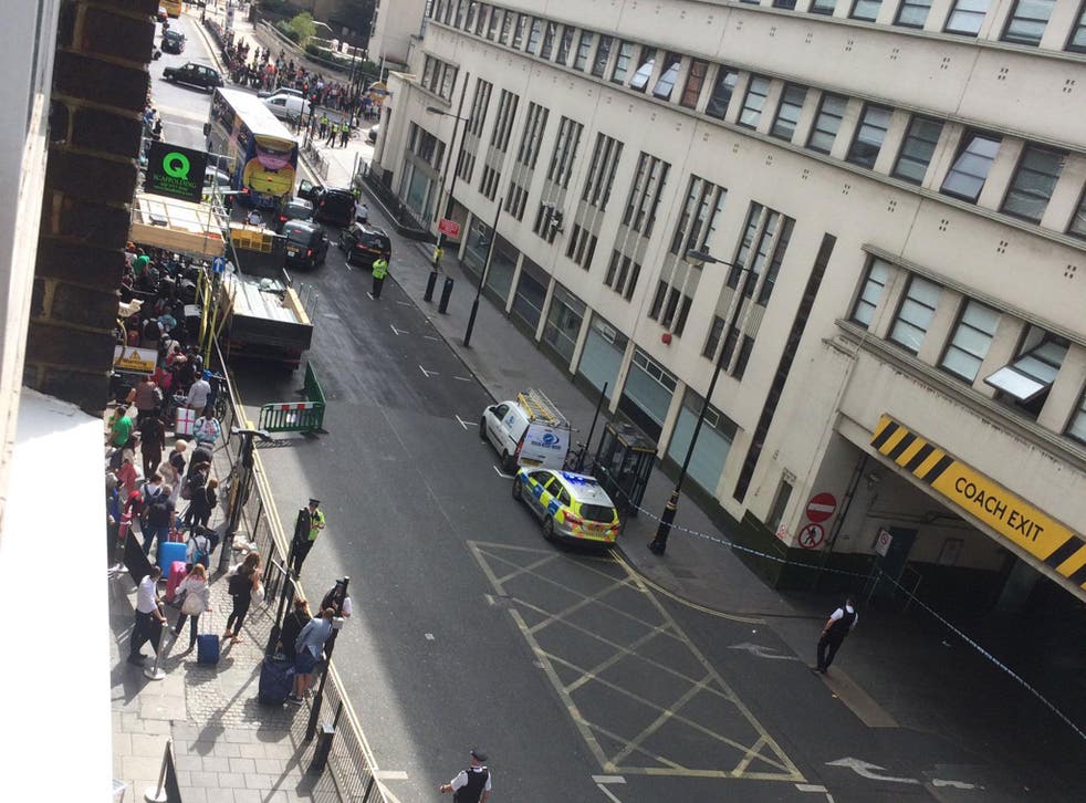 Pictures shared on social media show a large police presence outside the station