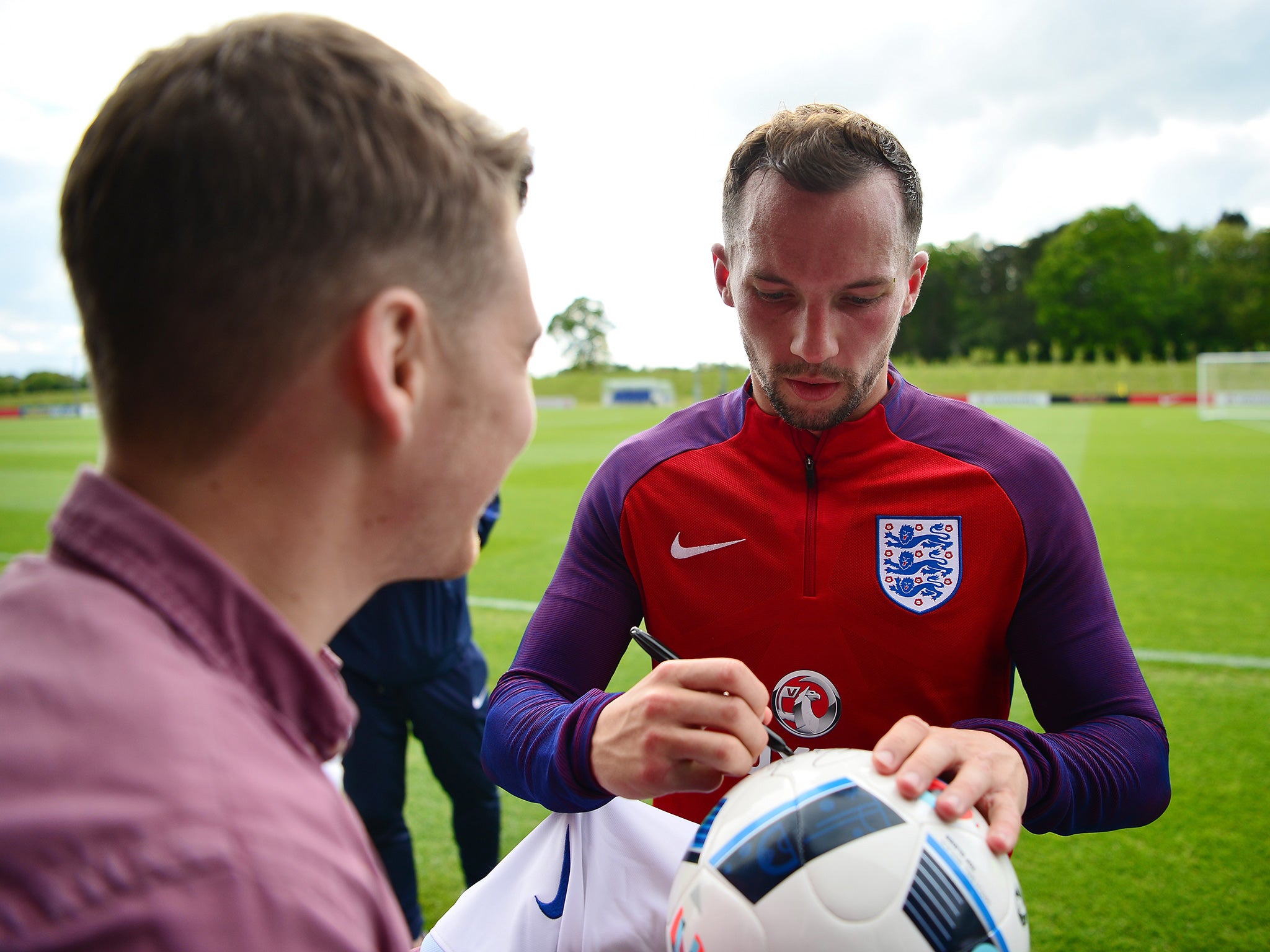 Drinkwater greets fans during an England training session