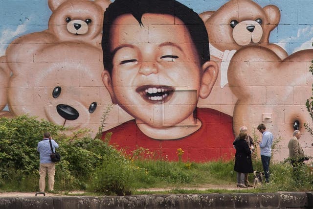 A mural depicting Syrian refugee Alan Kurdi in Frankfurt harbour