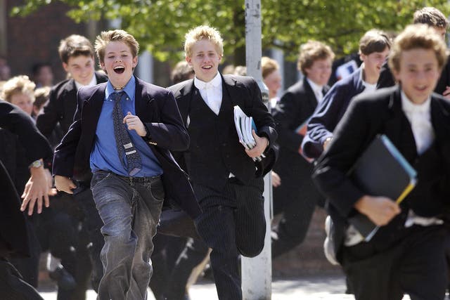 A Crowd Of Eton Boys Happily Running Out Of School On The Day They Finish Their Examinations At Eton College Boarding School.