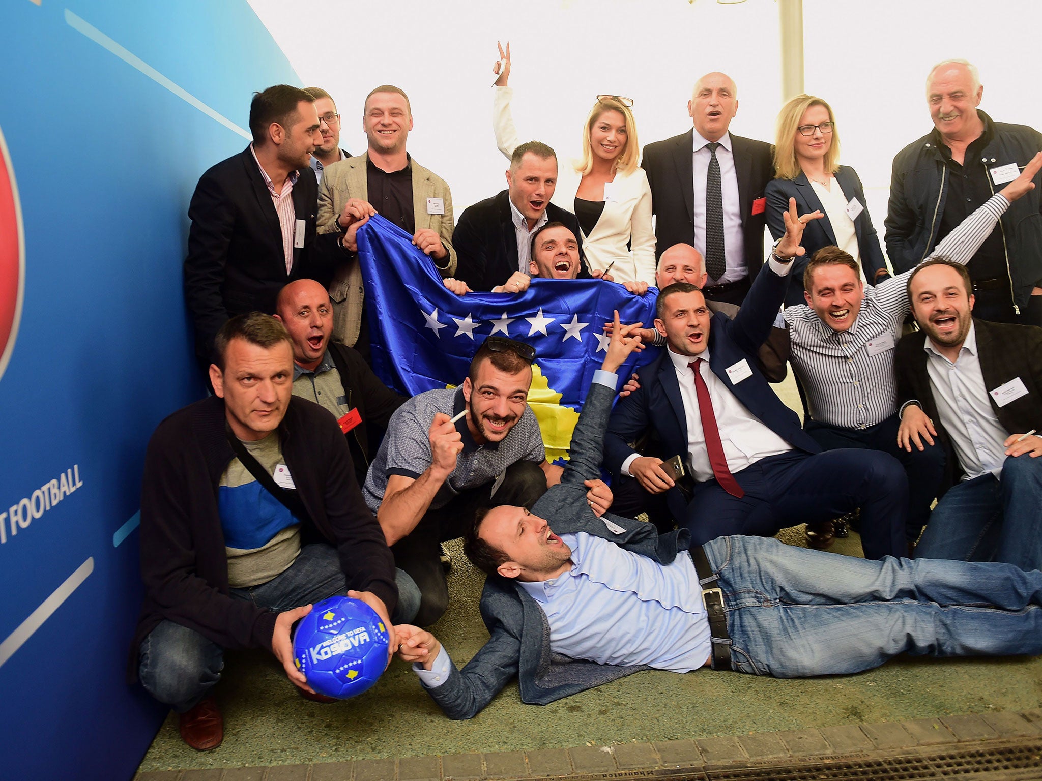 Delegation members of Kosovo celebrate gaining Uefa membership earlier this year
