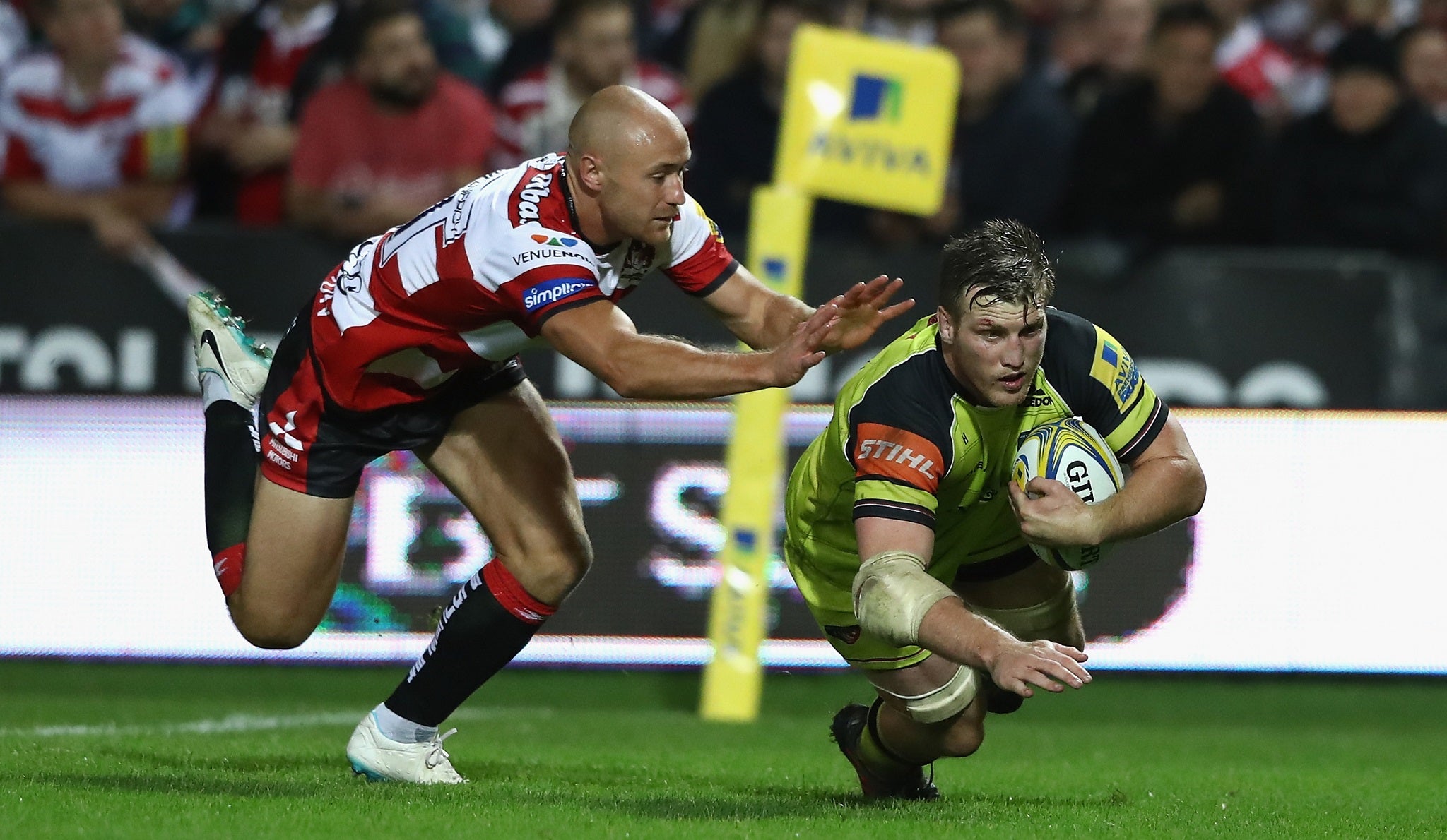 Brendan O'Connor dives over for a try to level the scores