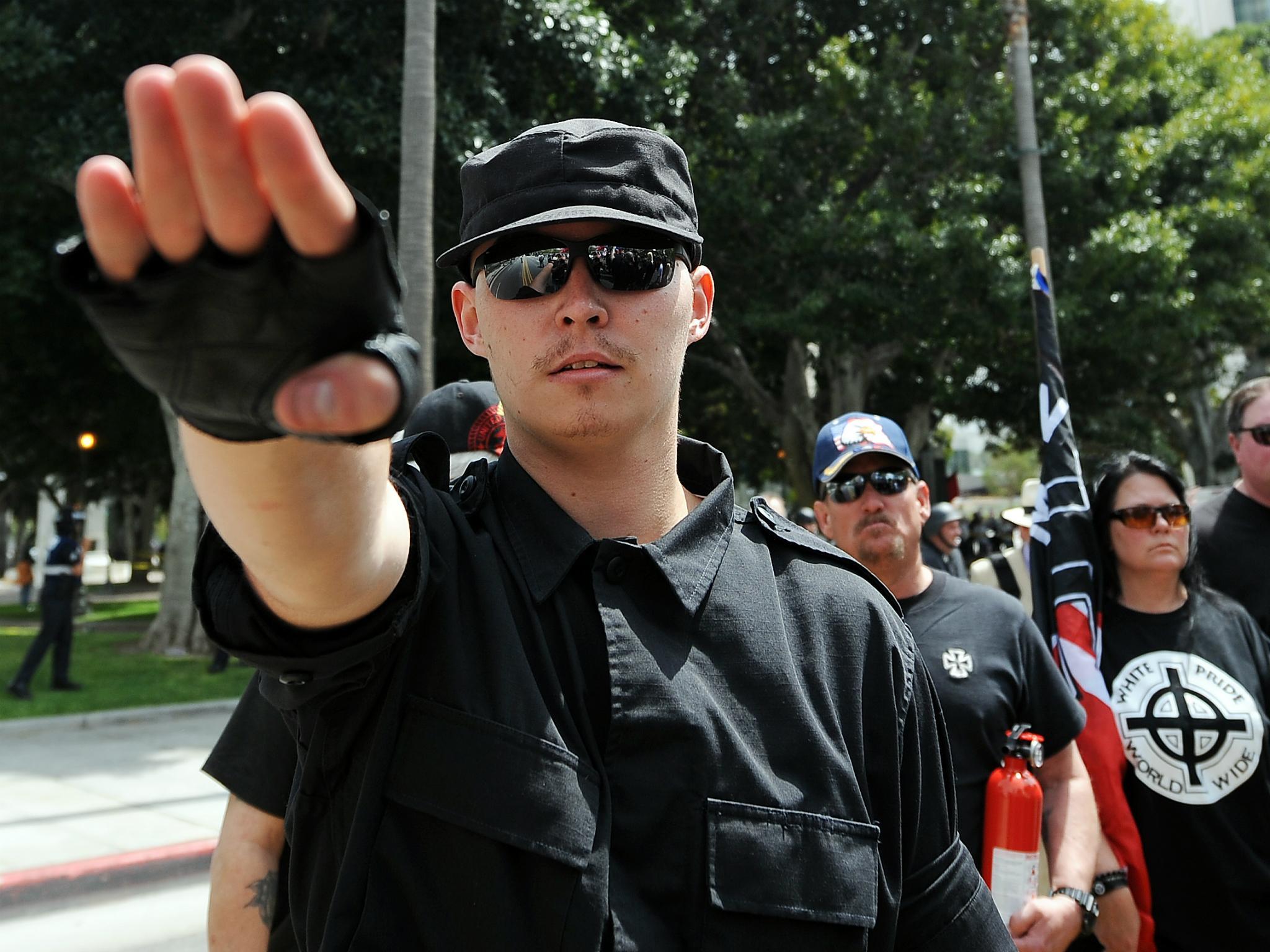 A member of the American National Socialist Movement <em>Gabriel Buoys/Getty</em>