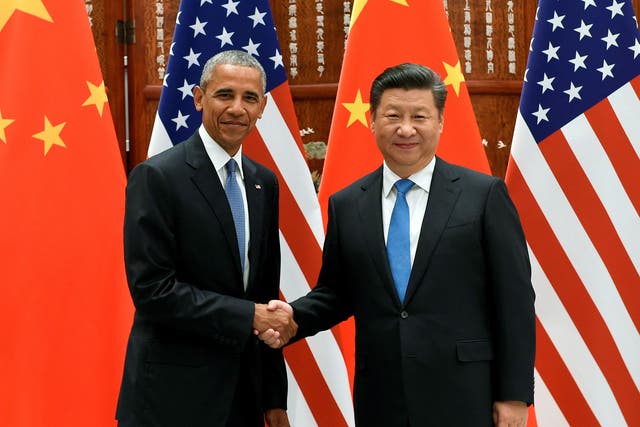 Chinese President Xi Jinping and U.S. President Barack Obama shake hands during their meeting at the West Lake State Guest House in Hangzhou, China September 3, 2016