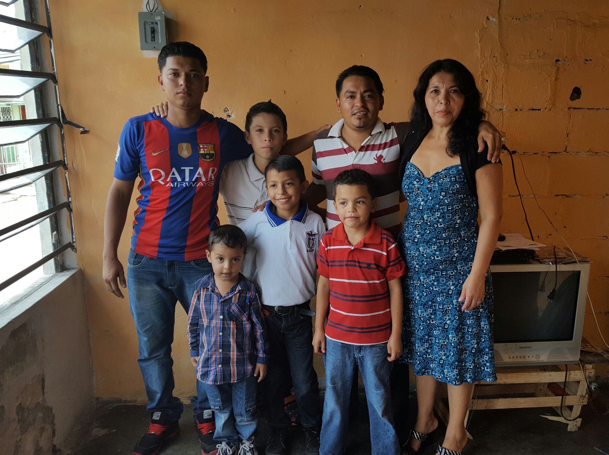 Rafael, second from far right, fled Honduras with his five children to seek refuge in Mexico