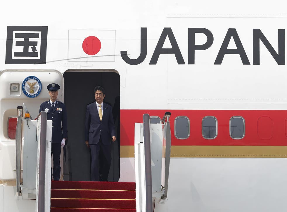 Japan's Prime Minister Shinzo Abe arrives in China for the G20 meeting
