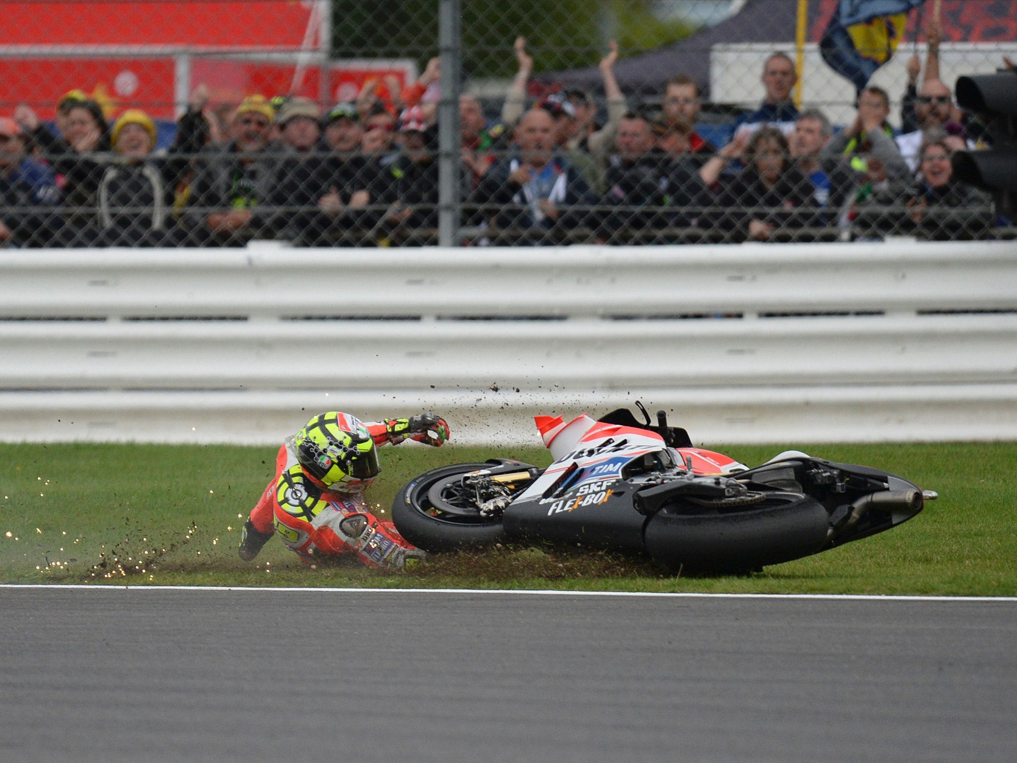 Andrea Iannone crashed out of second place