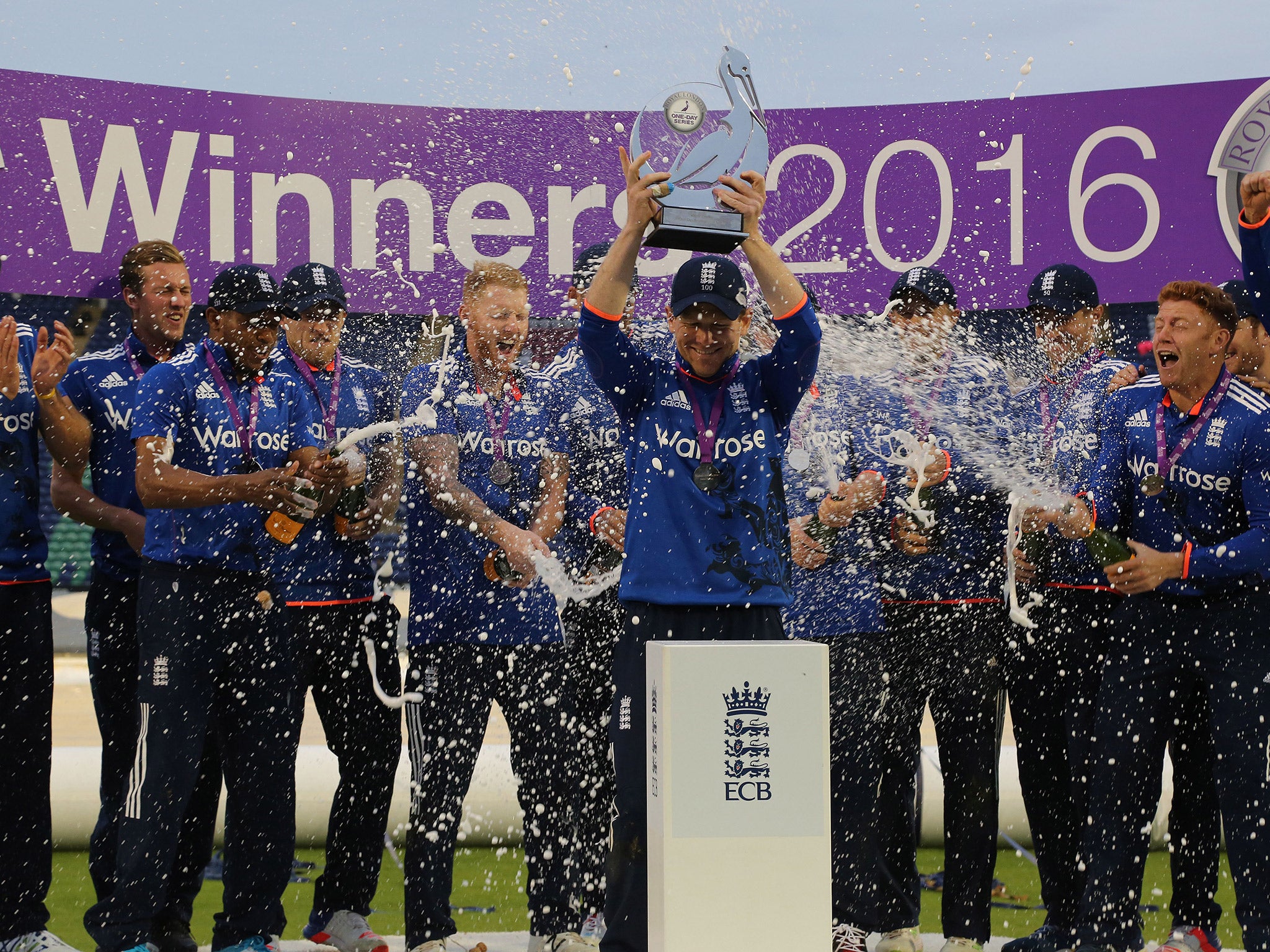 Eoin Morgan lifts the Royal London Series trophy despite defeat in the last ODI
