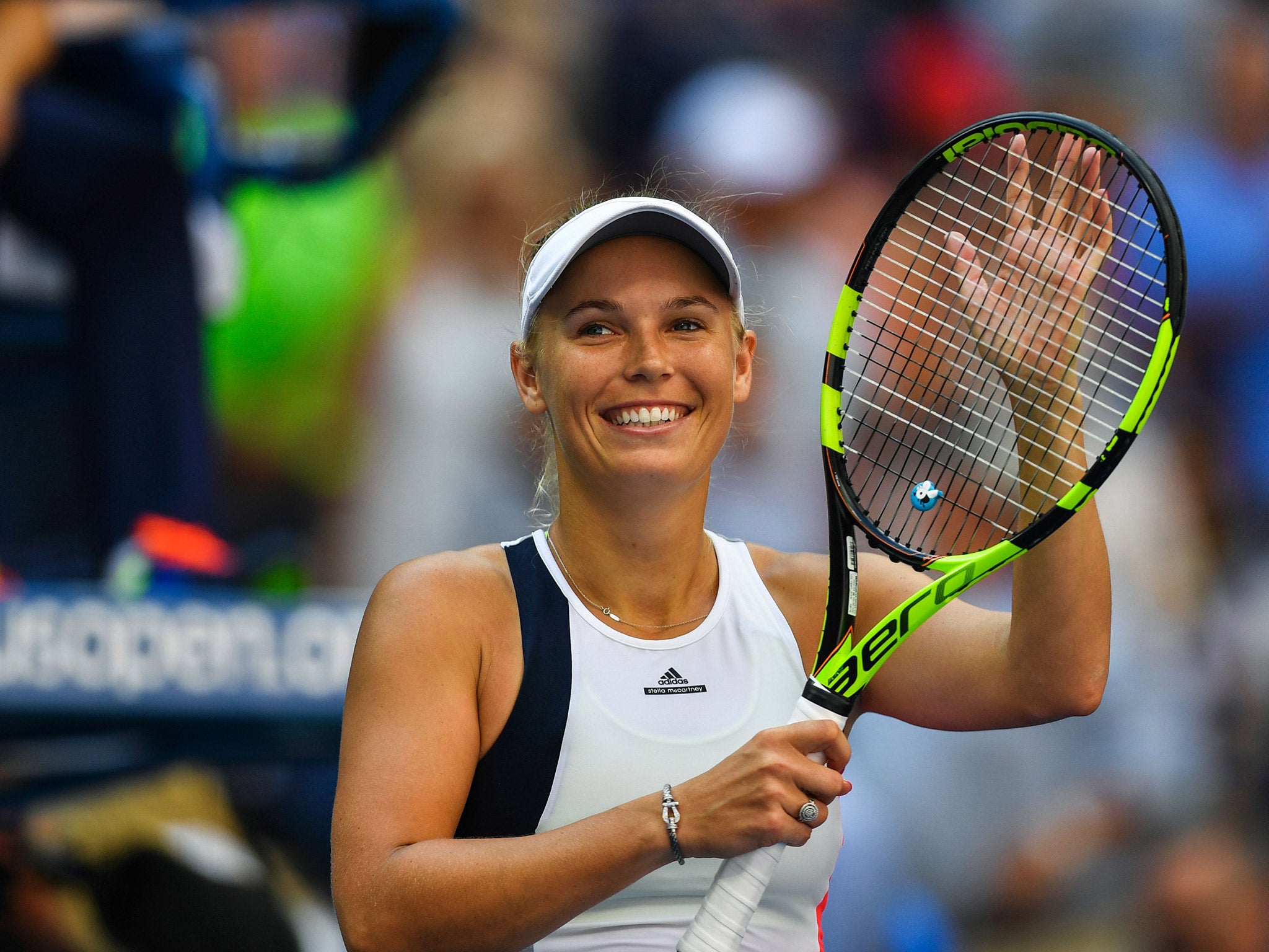 Caroline Wozniacki celebrates her fourth round victory over Madison Keys