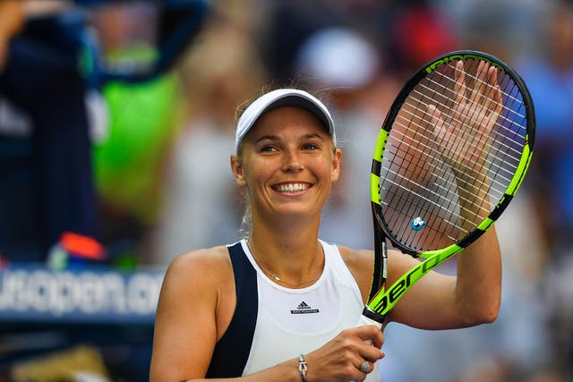 Caroline Wozniacki celebrates her fourth round victory over Madison Keys