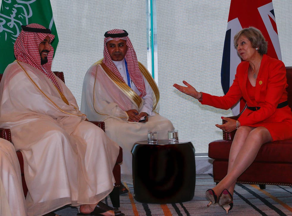 British PM Theresa May meets Saudi Arabia's delegates at the G20 summit in Hangzhou, China