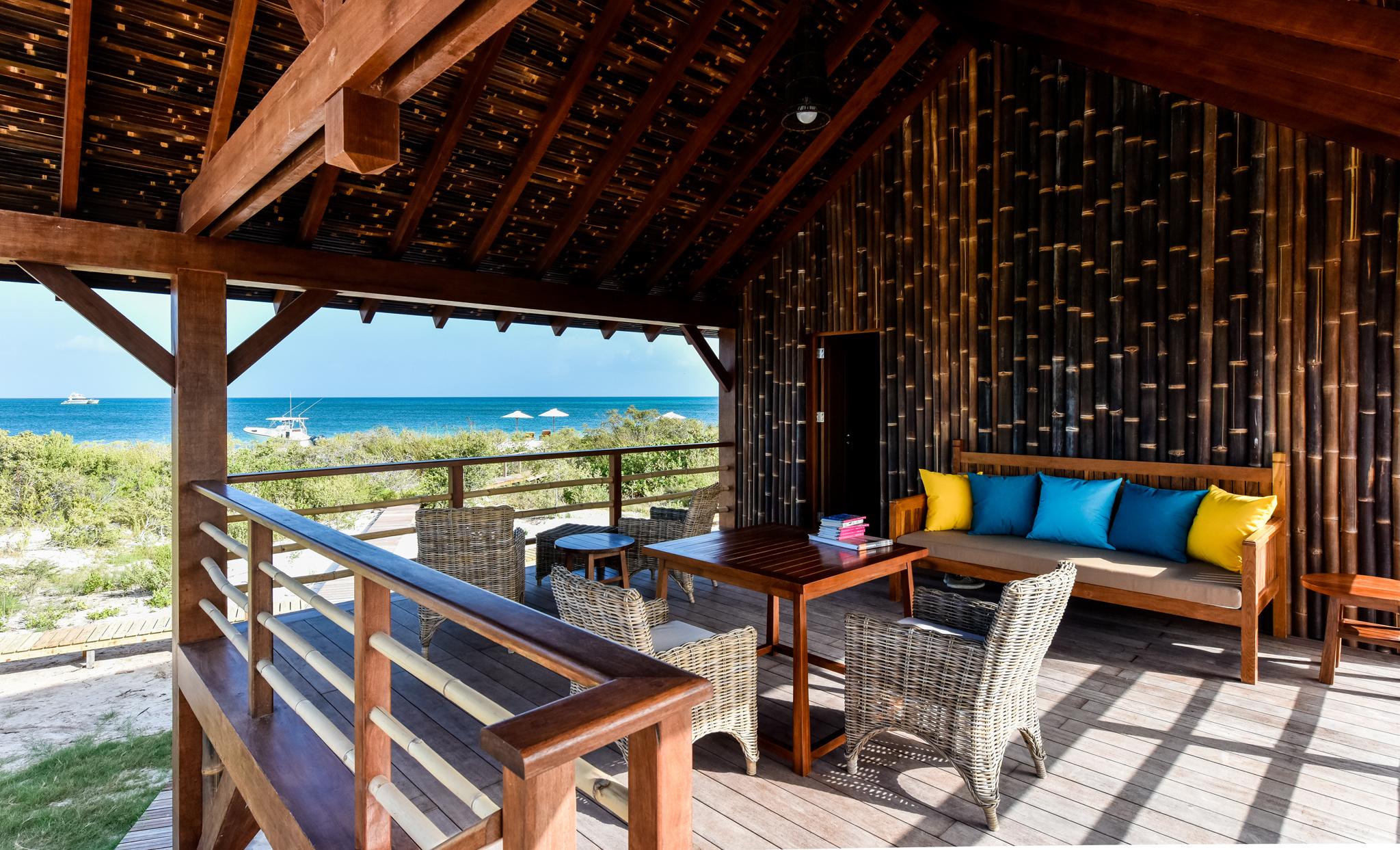 Balconies, with their own dining areas, look out on to the sea