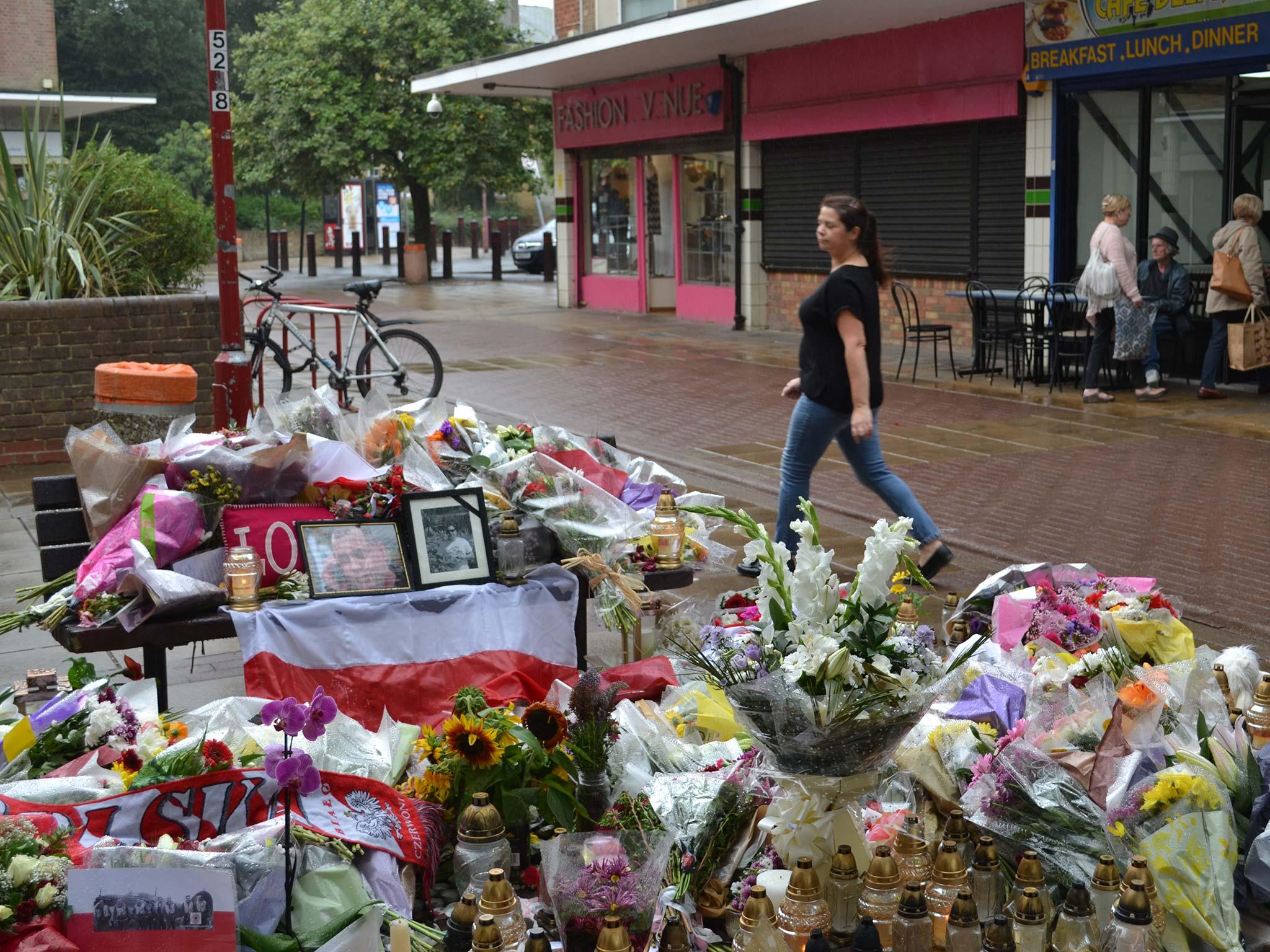 Tributes at the site where Arek Jozwik was attacked