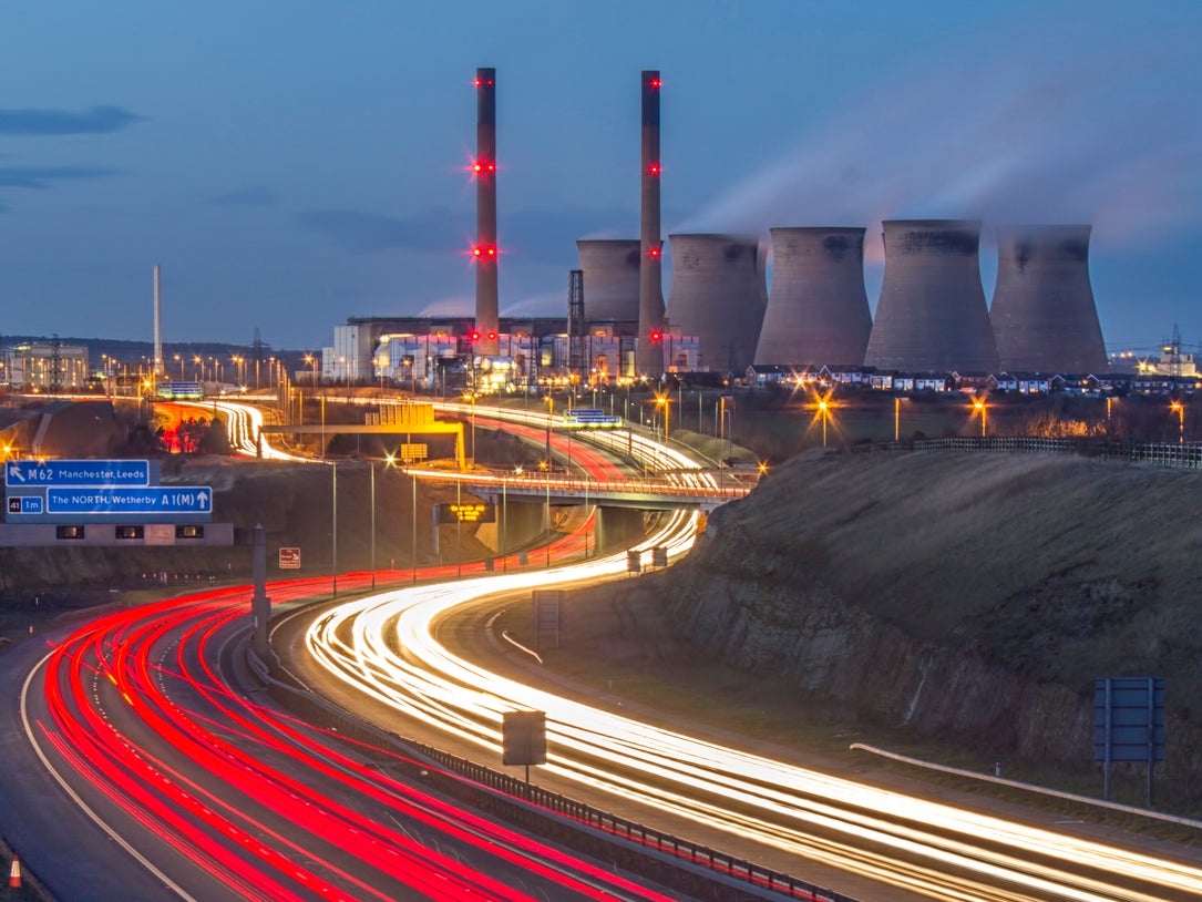 Power stations, like this one in Ferrybridge, Yorkshire, along with car engines, release nanoparticles including magnetite, which has now been found in human brains and could be linked to Alzheimer’s