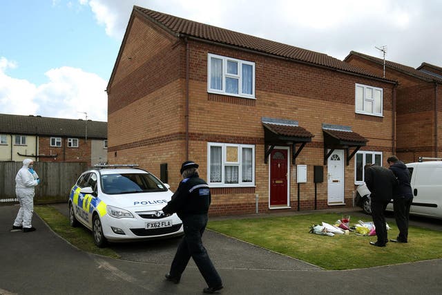 The scene outside a house in Spalding, Lincolnshire, where the bodies of 49-year-old Elizabeth Edwards and her 13-year-old daughter Katie were found