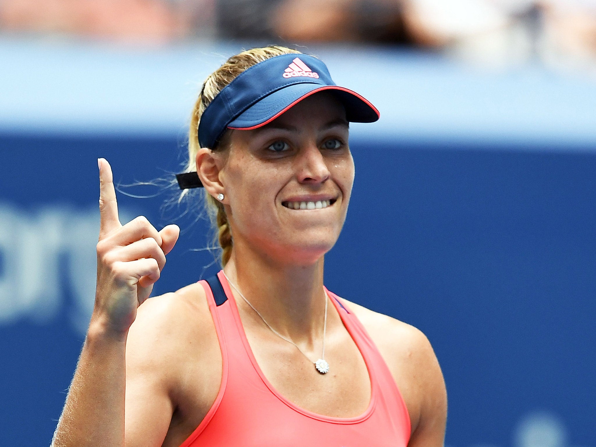 Angelique Kerber celebrates after her US Open quarter-final victory over Roberta Vinci