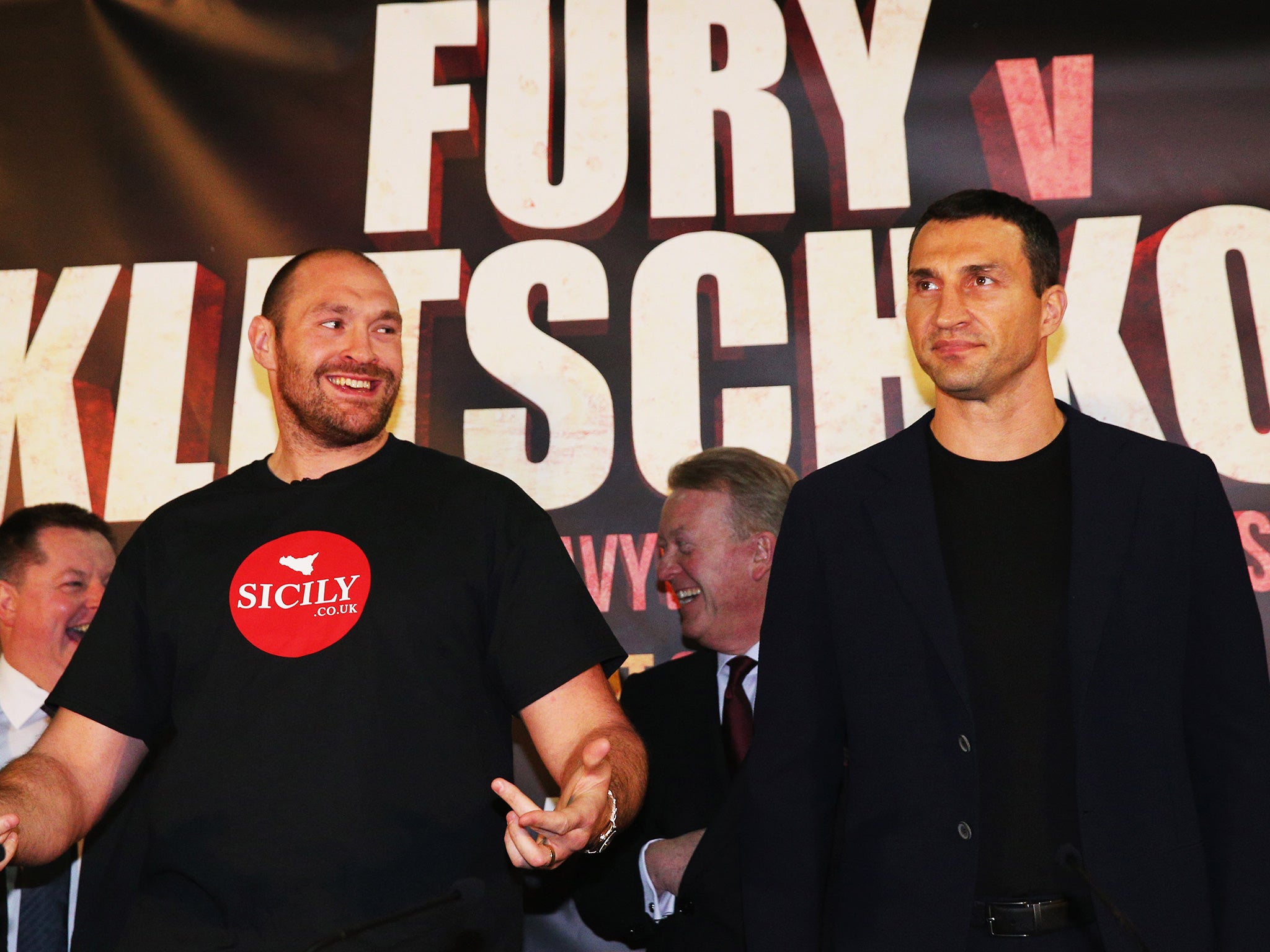 Fury and Klitschko at a pre-fight press conference ahead of the original 9 July date