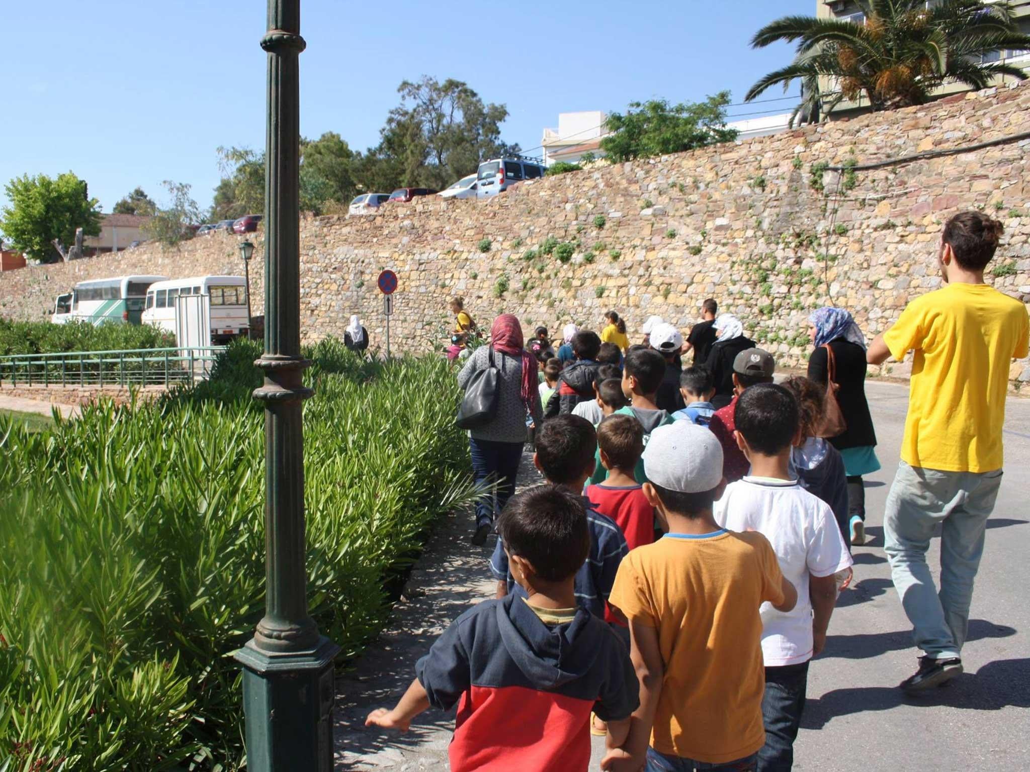 Migrant children on their morning walk through Chios (Refugee Education Chios )