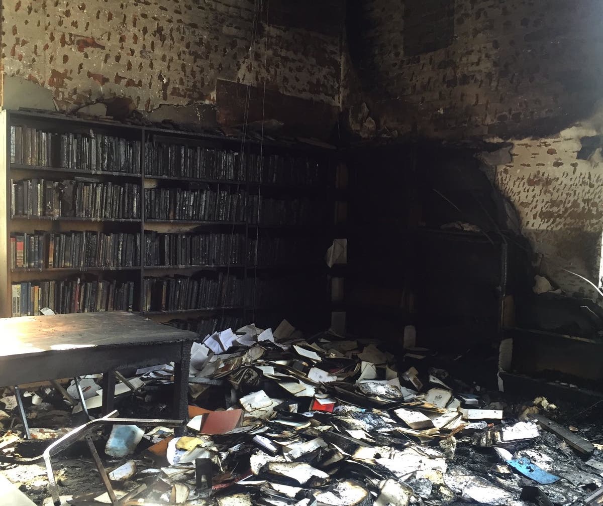 Library torched in ‘Nazistyle’ book burning after student 'raped by