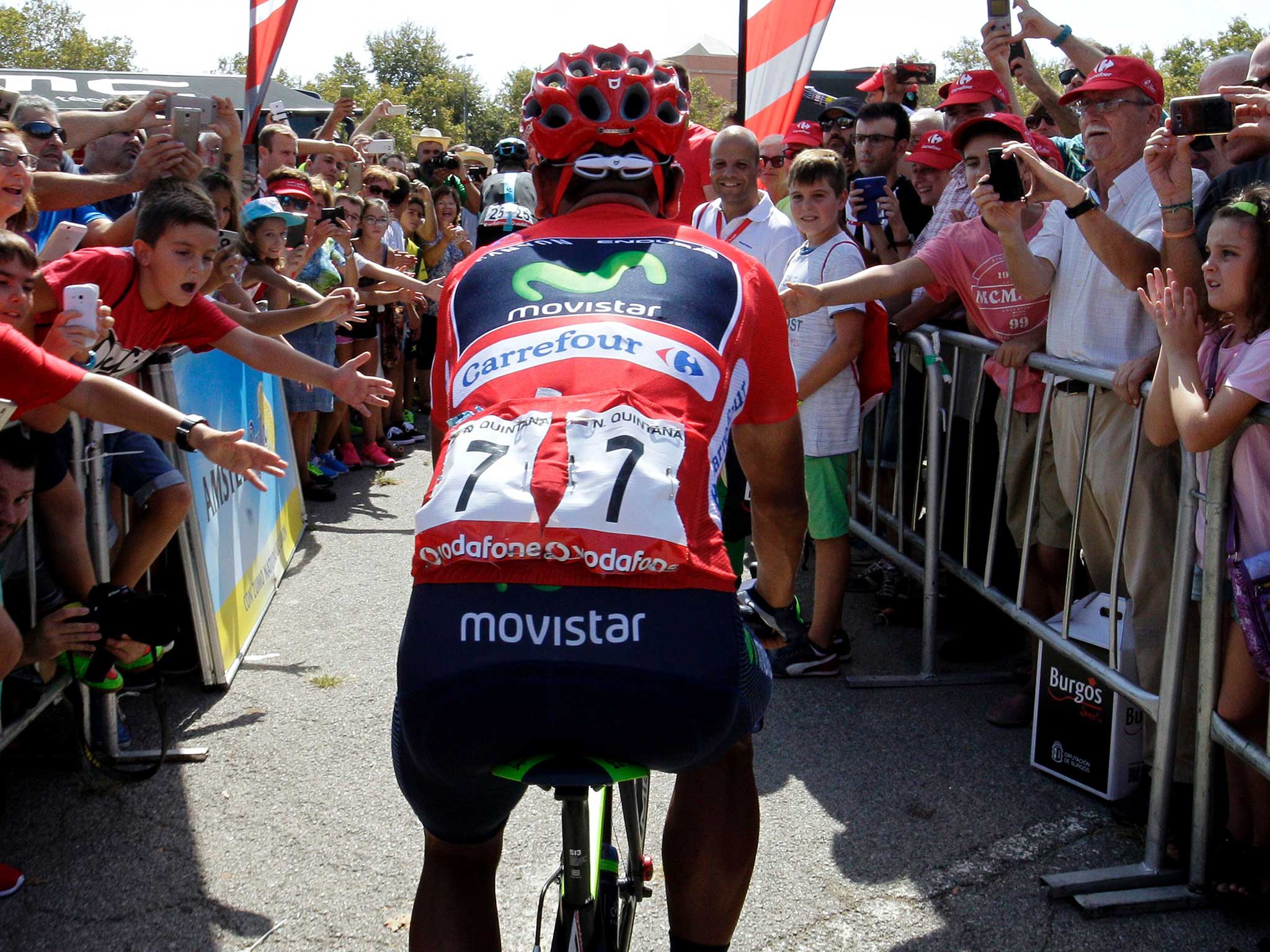 Nairo Quintana plots a route through the spectators at Vuelta