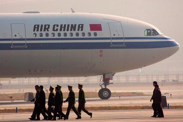 Air China advised travellers to avoid areas populated by 'Indians, Pakistanis and black people'