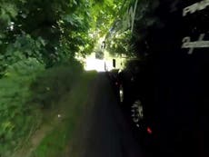 Team Sky apologise after official coach is filmed nearly running cyclist off the road