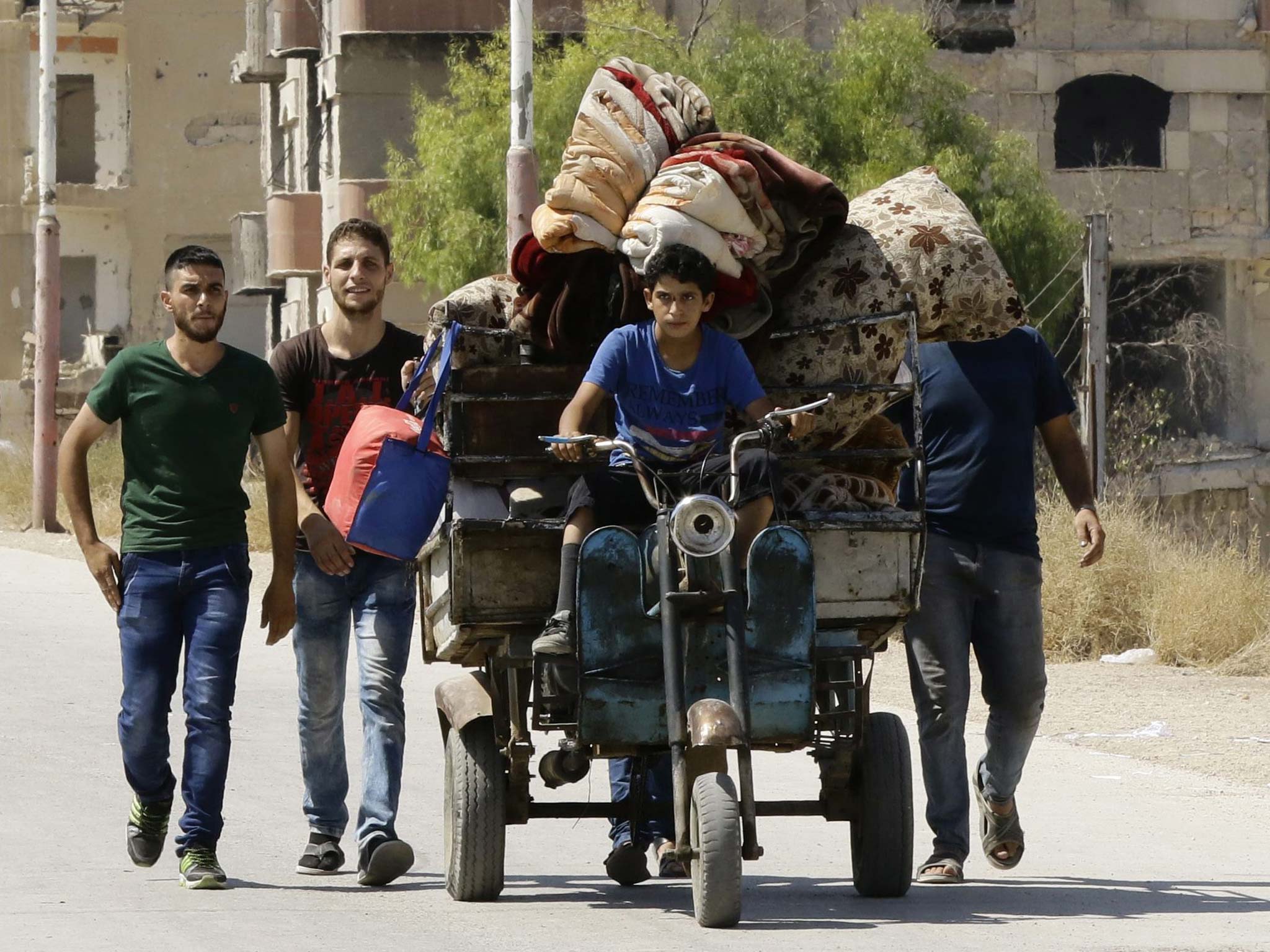 Syrian civilians being evacuated from the Daraya district, southwest of Damascus on 8 September