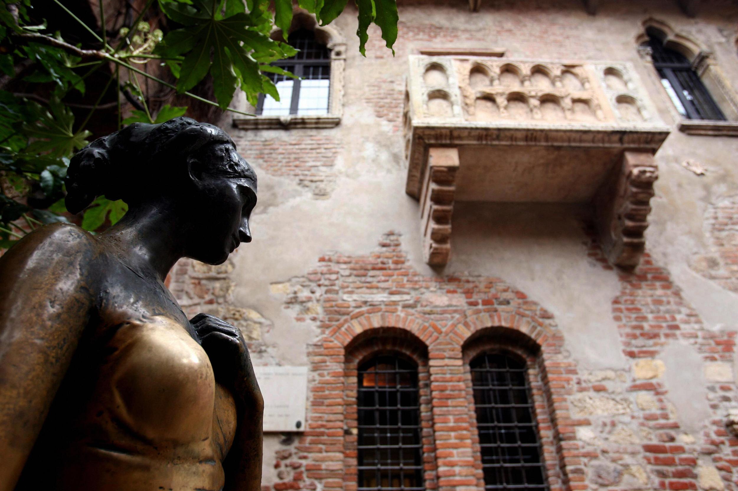 Juliet's House, with the bronze statue of Juliet in front, is a big favourite with visitors