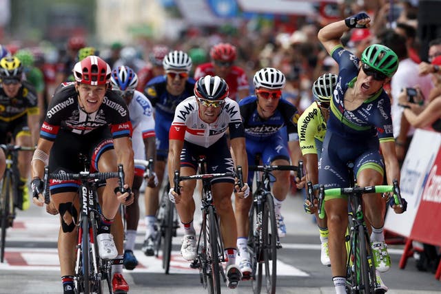 Denmark’s Magnus Cort Nielsen (right) celebrates winning the 18th stage of the Vuelta a Espana