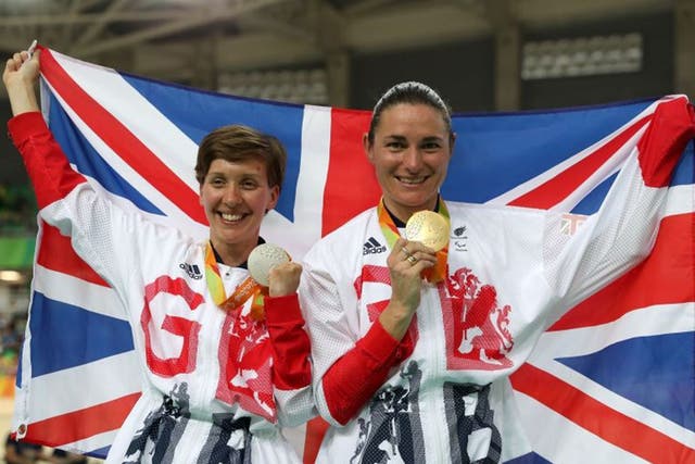 Crystal Lane (left) and Sarah Storey with their Paralympic medals at the Rio velodrome on Thursday evening