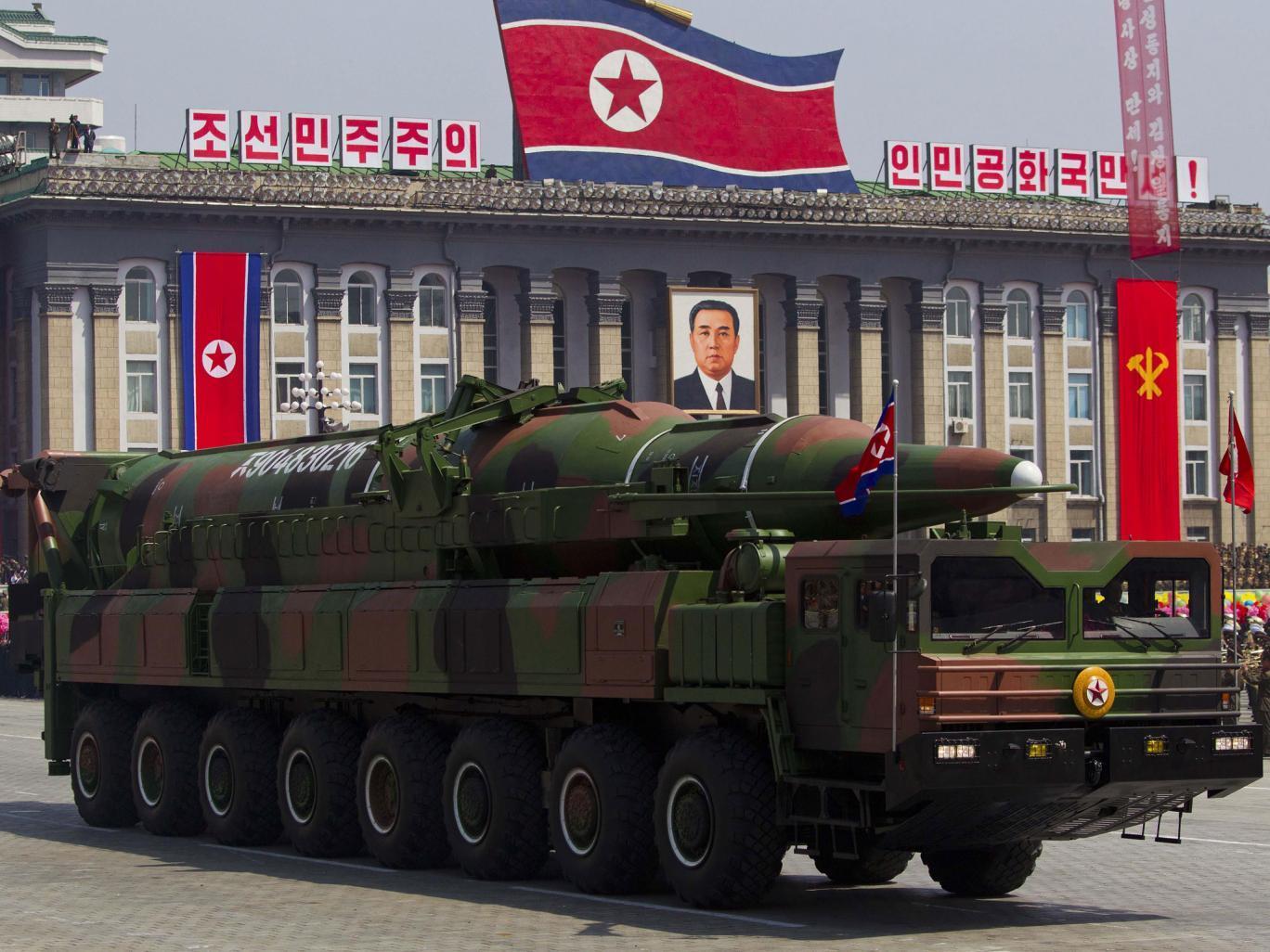 A North Korean vehicle carrying a missile passes by during a mass military parade in Pyongyang's Kim Il Sung Square to celebrate the centenary of the birth of the late North Korean founder Kim Il Sung