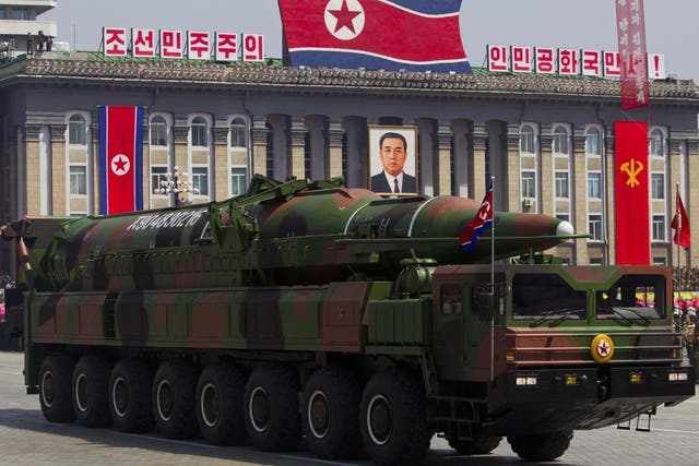 A North Korean vehicle carrying a missile passes by during a mass military parade in Pyongyang's Kim Il Sung Square to celebrate the centenary of the birth of the late North Korean founder Kim Il Sung