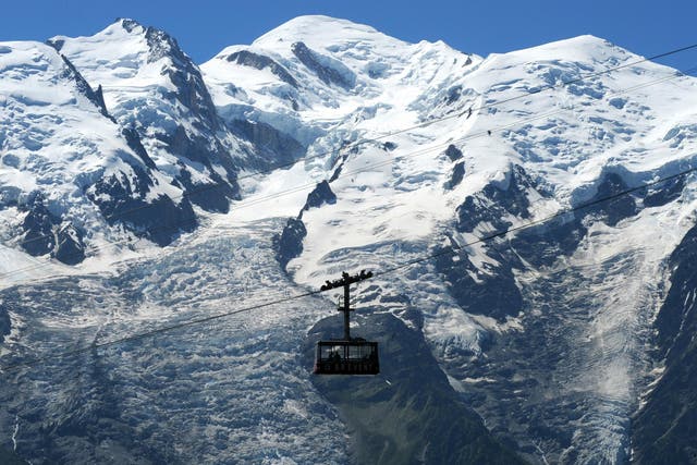 The Brevent cable car passing the Mont Blanc mountain