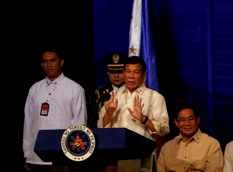 Philippines President Rodrigo Duterte speaks to members of the Filipino community in Jakarta, Indonesia