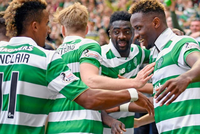 Celtic players congratulate Dembele on his hat-trick