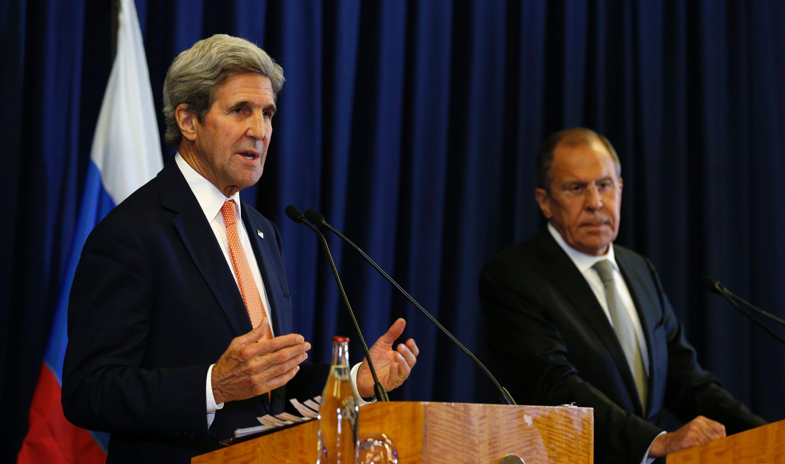 US Secretary of State John Kerry (L) and Russian Foreign Minister Sergei Lavrov attend a press conference after meetings to discuss the Syrian crisis went late into the evening on September 9, 2016, in Geneva. The United State and Russia on Friday agreed a plan to impose a ceasefire in the Syrian civil war and lay the foundation of a peace process, US Secretary of State John Kerry said.