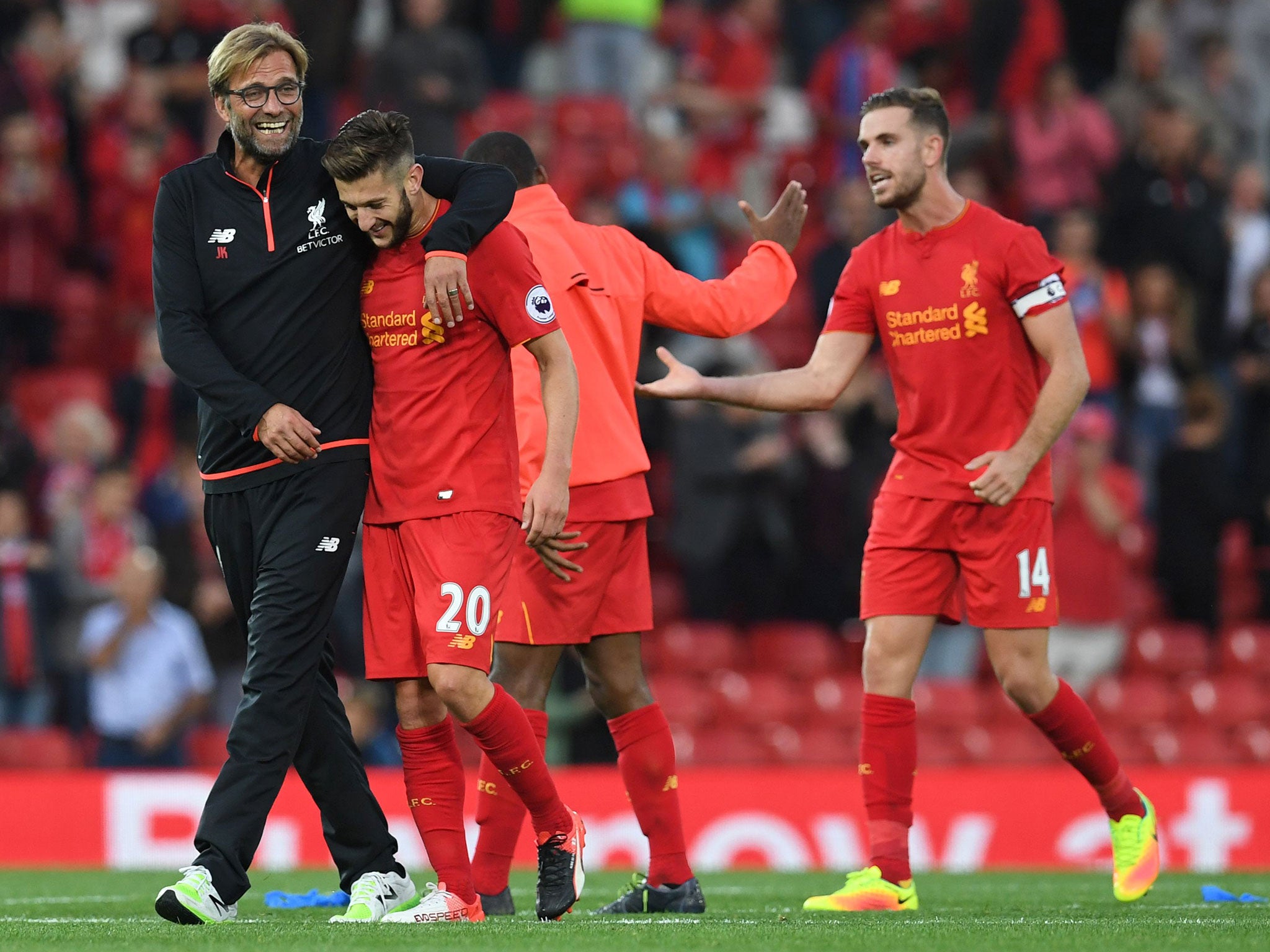 Jurgen Klopp with his players after the whistle at Anfield
