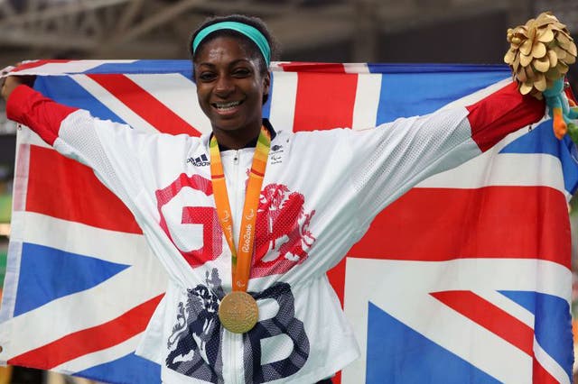 Great Britain's Kadeena Cox celebrates with her Gold medal won in the Women's C4-5 500m Time Trial final at the Olympic Veleodrome during the third day of the 2016 Rio Paralympic Games in Rio de Janeiro