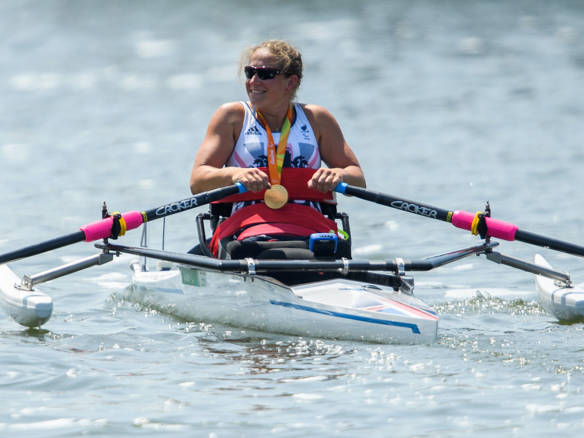 Morris reacts to winning arms-shoulders single sculls gold