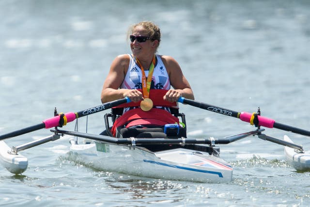 Morris reacts to winning arms-shoulders single sculls gold