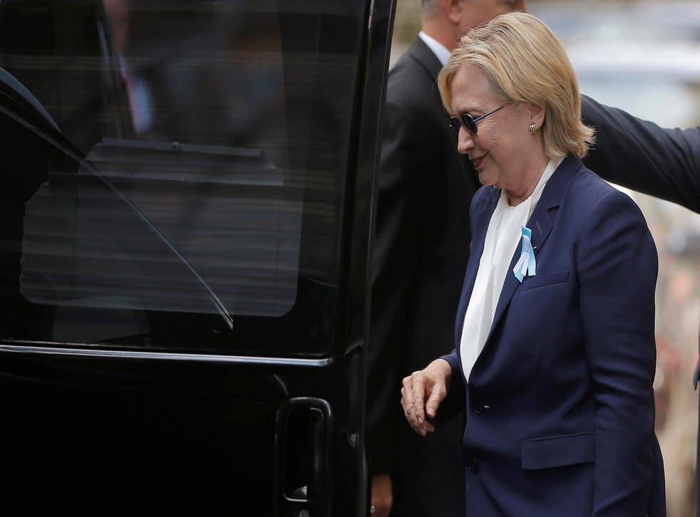 U.S. Democratic presidential candidate Hillary Clinton climbs into her van outside her daughter Chelsea's home in New York, New York, United States September 11, 2016, after Clinton left ceremonies commemorating the 15th anniversary of the September 11 attacks feeling 'overheated'