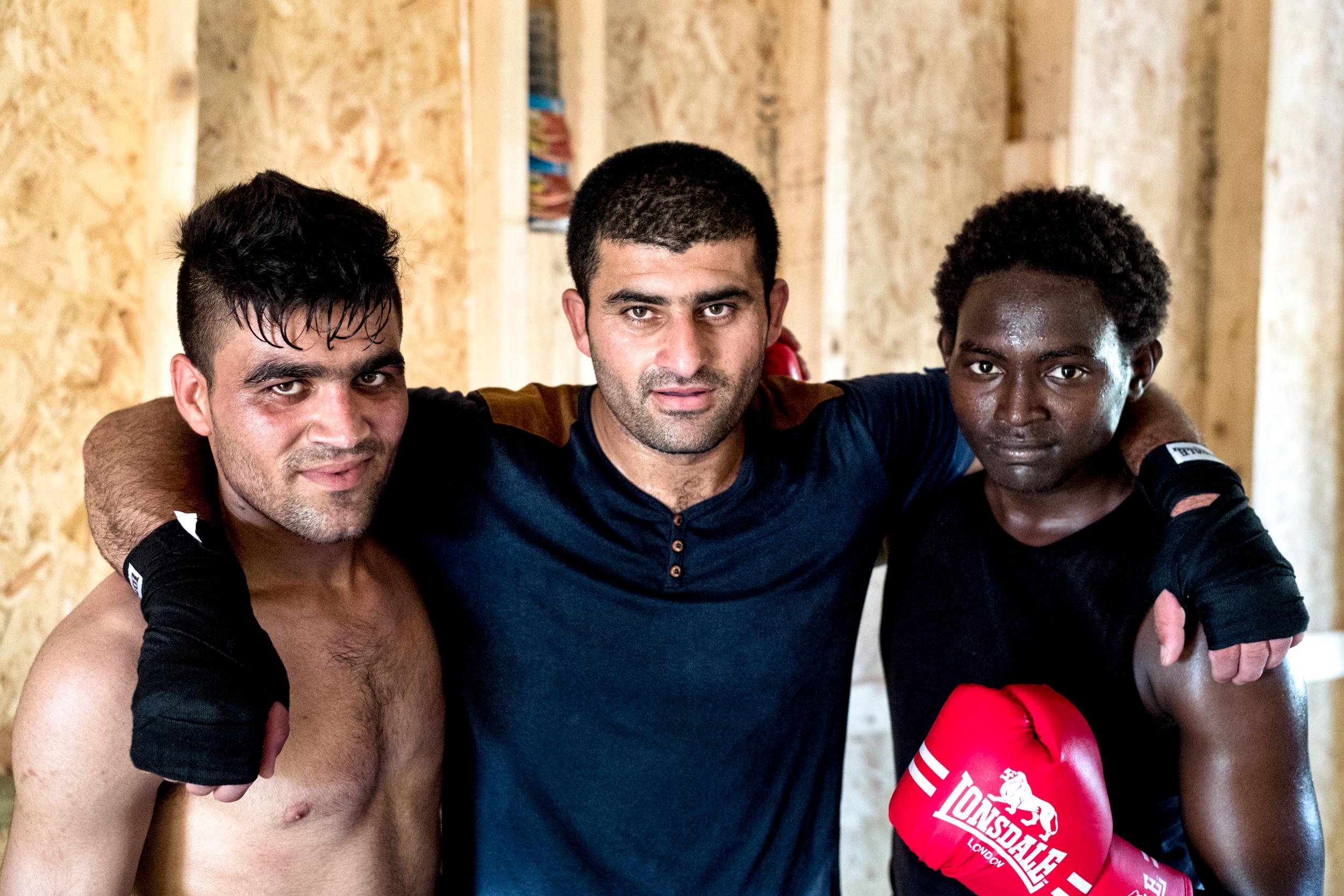 Arsala (centre) with two men of different nationalities training at the club (Photo: Alan Schaller)