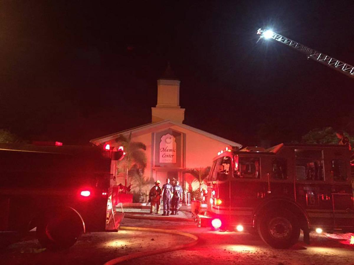 Firefighters at the Islamic Centre of Fort Pierce, Florida