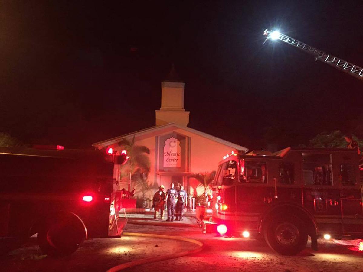Firefighters at the scene of a blaze at the Islamic Centre of Fort Pierce on Monday morning